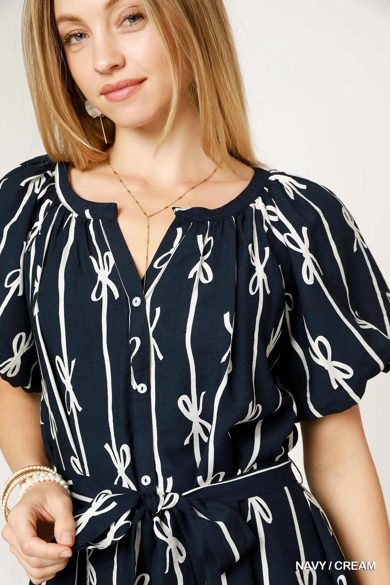 Navy bow print dress